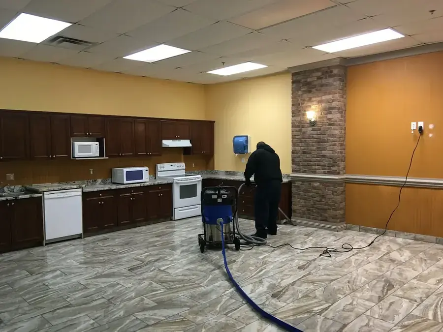 Technician extracting standing water from a Chula Vista, CA floor
